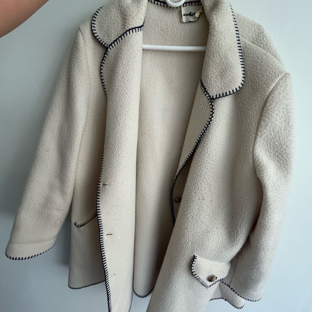 Chic Cream Teddy Jacket with Black Trim